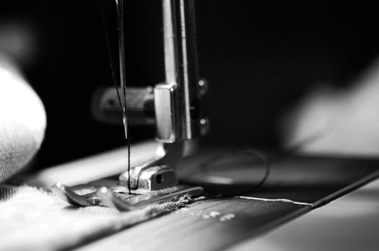 Fabrics - sewing machine grey-scale photography and close-up photography