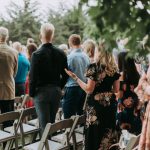 Wedding Guest - group of people praying