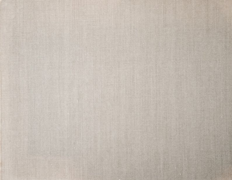 Fabrics - a white sheet of paper with a brown border