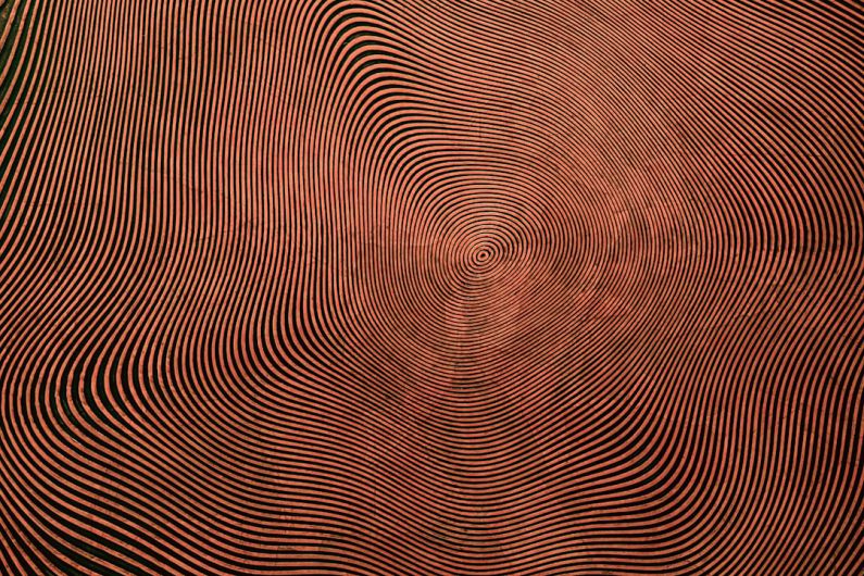 Patterns - a red and black background with wavy lines