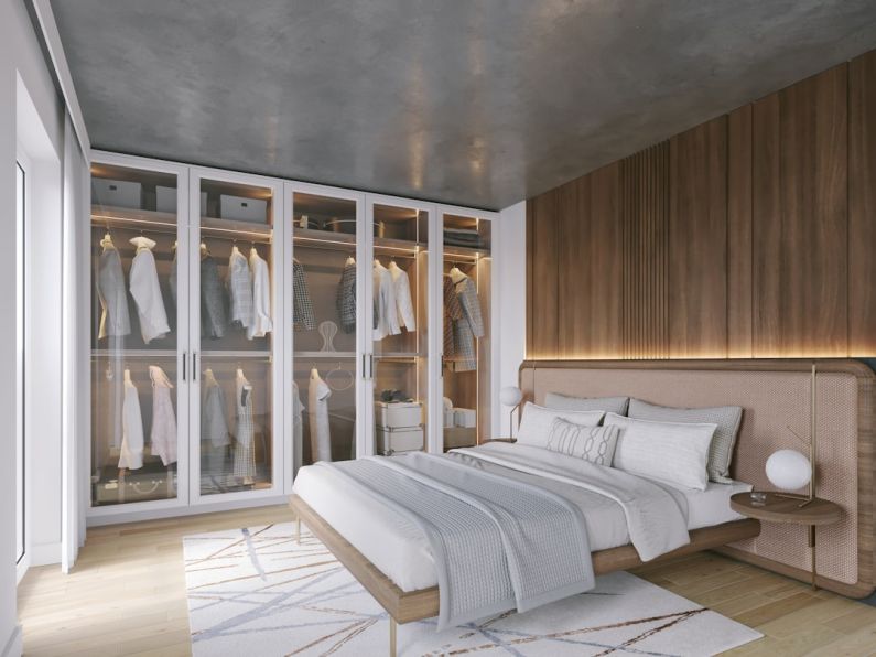 Wardrobe - a bedroom with a bed and a closet