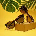 Accessories - two tortoiseshell-framed Wayfarer-styled sunglasses with box