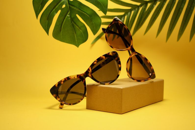 Accessories - two tortoiseshell-framed Wayfarer-styled sunglasses with box