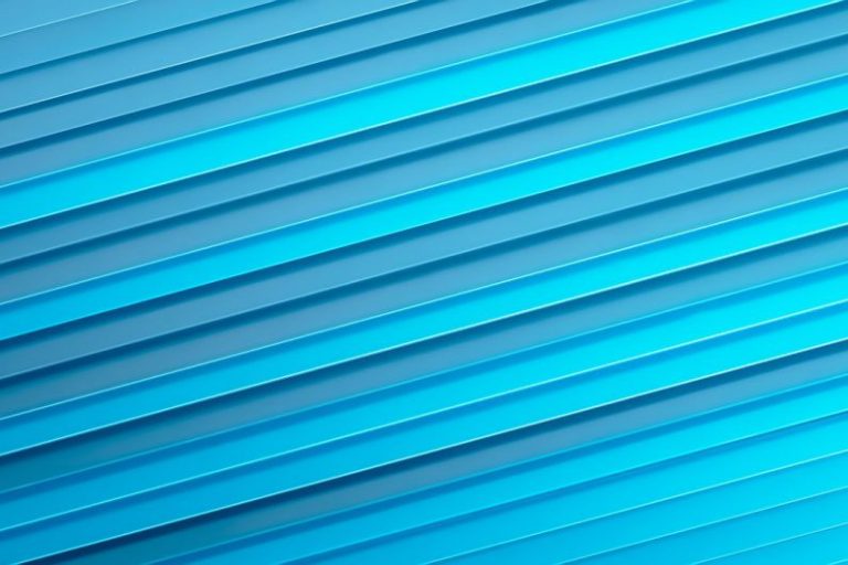 Layering - a close up of a blue wall with vertical lines